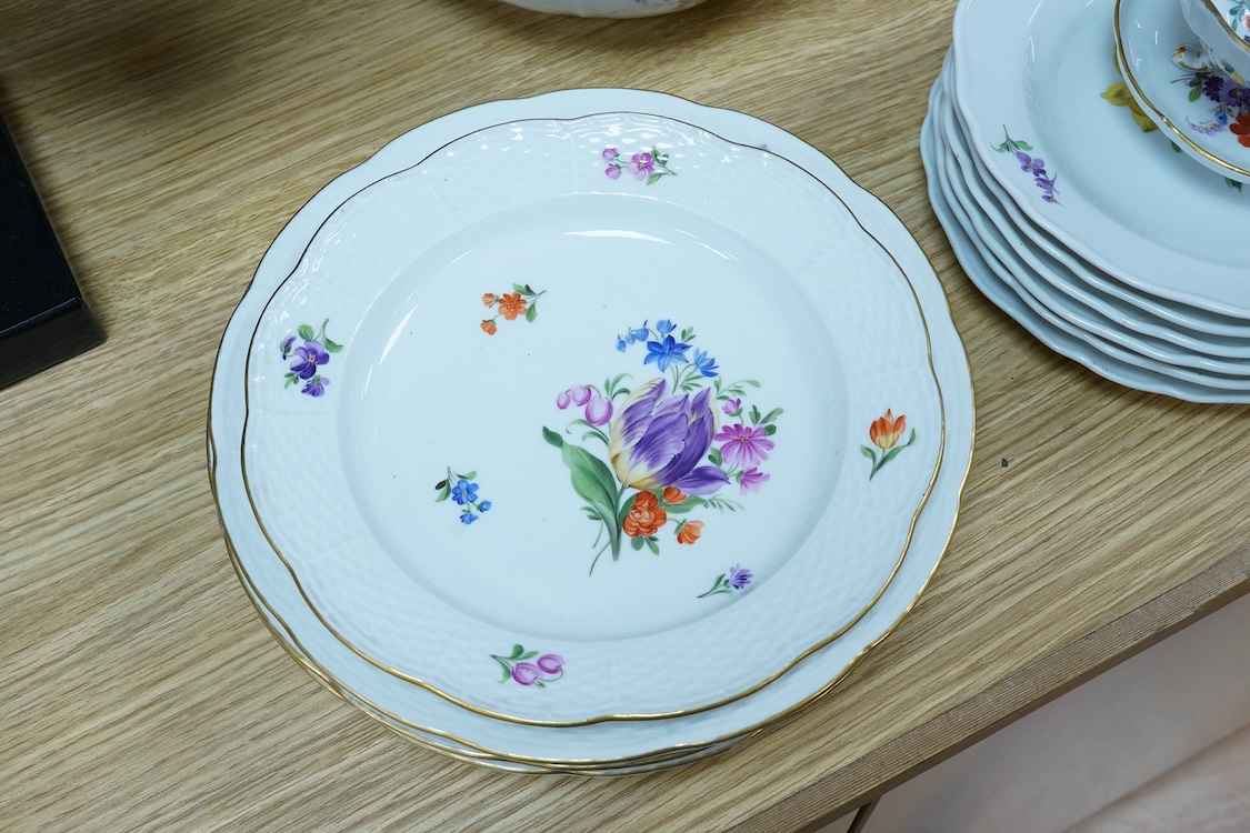 A collection of Meissen porcelain to include floral side plates and a German floral encrusted pot, 18cm high